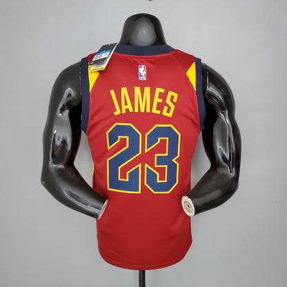 Gold James name and navy number 23 on the back of Cavaliers jersey