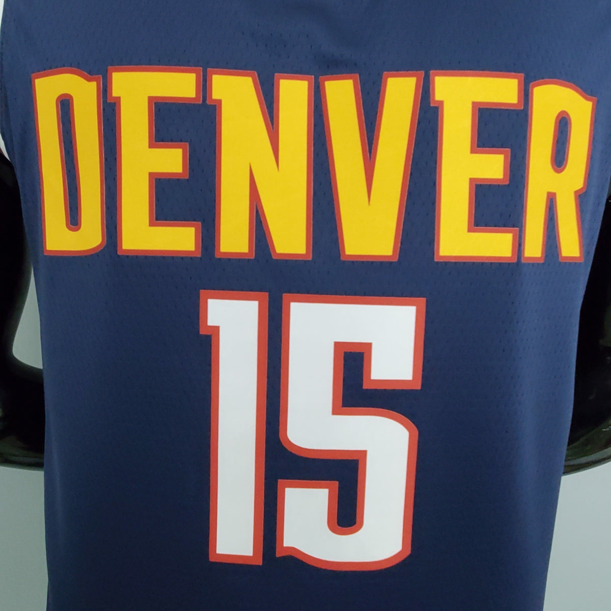 Denver Nuggets Nikola Jokić number 15 navy jersey back view