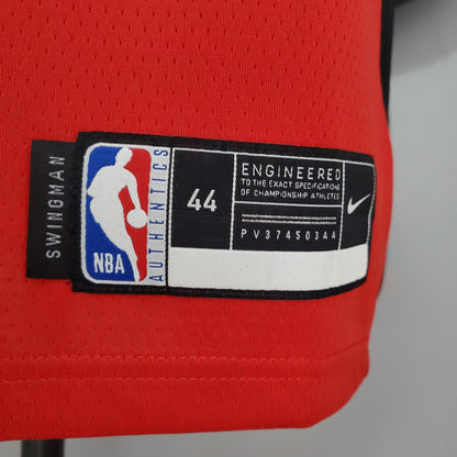 White Harden name and number 13 on the back of red Rockets jersey