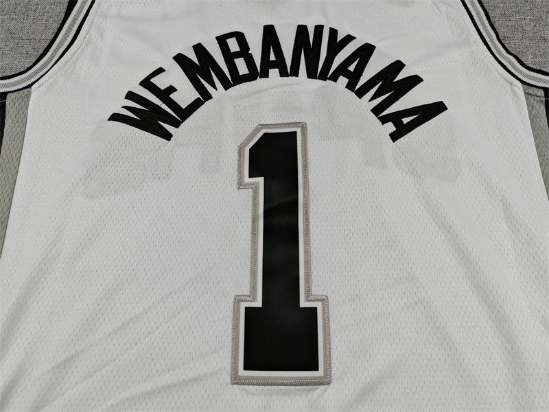 Wembanyama name and black number 1 with silver edging on white Spurs jersey back detail