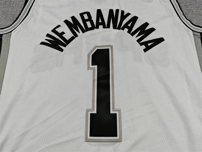 Wembanyama name and black number 1 with silver edging on white Spurs jersey back detail