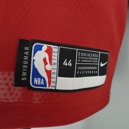 Gold Cleveland lettering and navy number 23 on wine Cavaliers jersey
