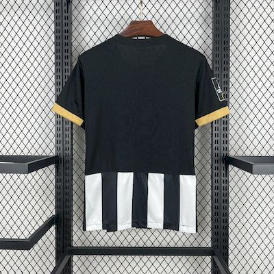 Angers Home Jersey 2025/26 front view with black and white stripes and gold-coloured trim