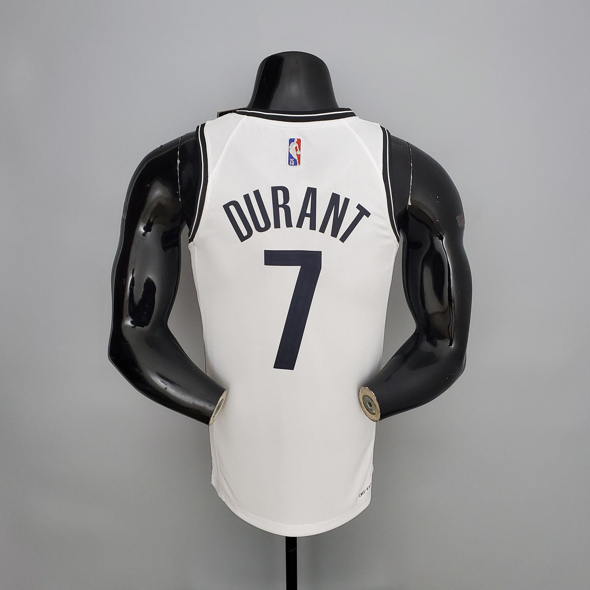 Brooklyn Nets Kevin Durant number 7 white jersey front with black Brooklyn lettering and V-neck trim