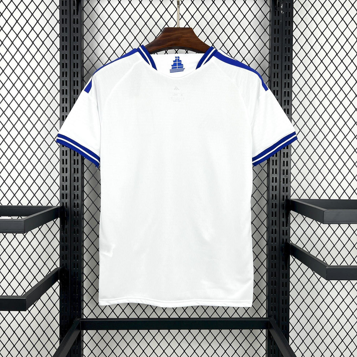 Close-up of the Greece crest on the white Greece Away Jersey 2026