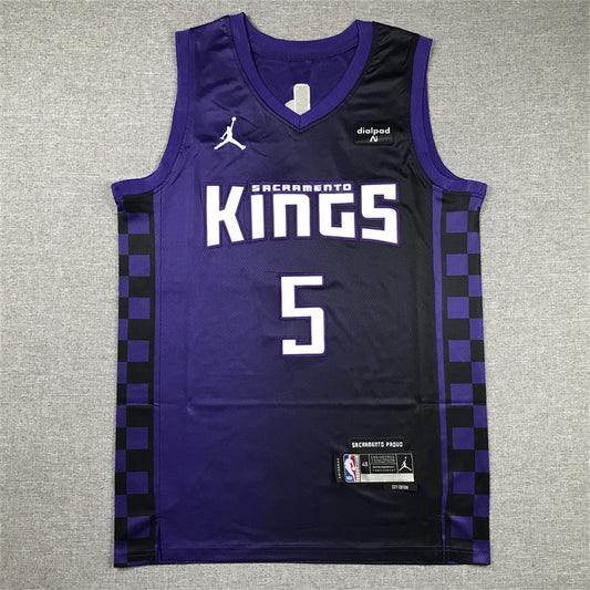 Sacramento Kings chest lettering and white number 5 detail on purple black gradient jersey