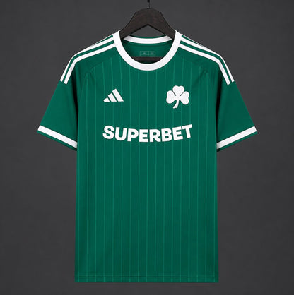 Front view of the Panathinaikos 2026/27 home jersey in deep green with white shoulder stripes, shamrock crest, and tonal pinstripes