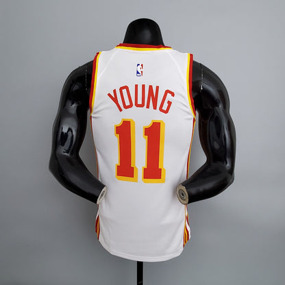Close-up of Atlanta lettering and number 11 on white basketball jersey front