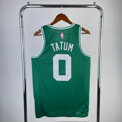 Boston Celtics green jersey close-up showing hem label, textured fabric and side split