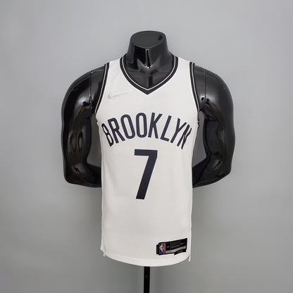 Brooklyn Nets white jersey hem-label close-up with NBA 75th-anniversary marking