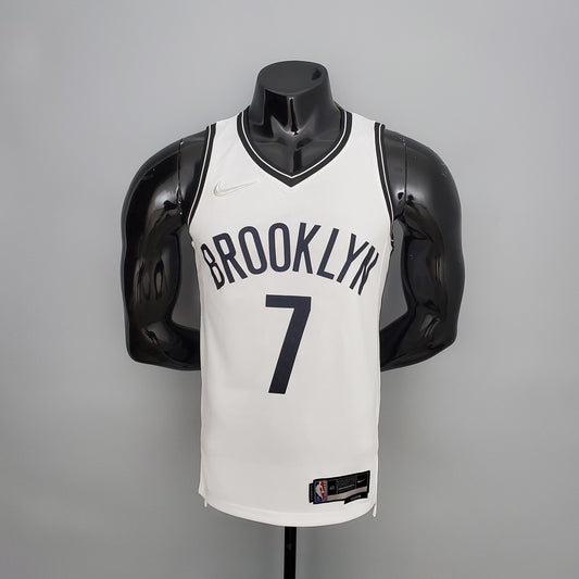 Brooklyn Nets white jersey hem-label close-up with NBA 75th-anniversary marking