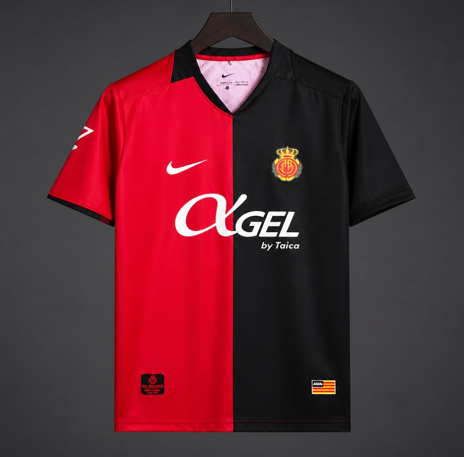 Front view of the red and black Mallorca 2026/27 home jersey