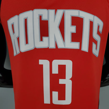 White Rockets lettering and number 13 on red Houston jersey