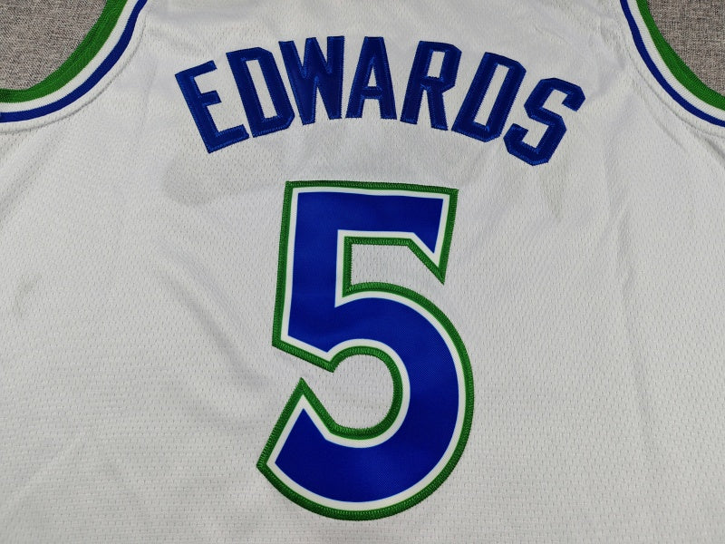 Blue Wolves lettering and number 5 with green outlines chest detail