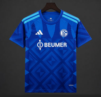 Schalke 04 Home Jersey 2026/27 front view in royal blue with geometric pattern and white club crest