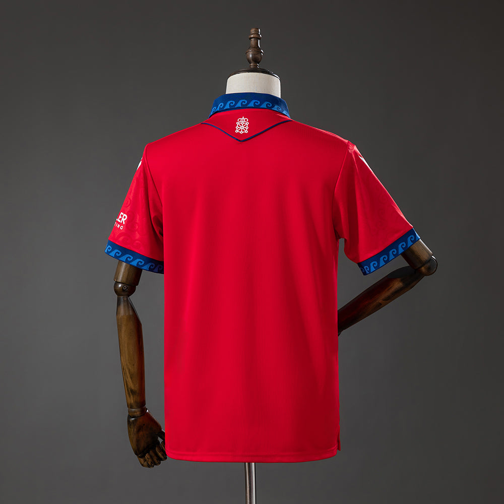 Back view of the red Osasuna 2026/27 home jersey with blue detailing