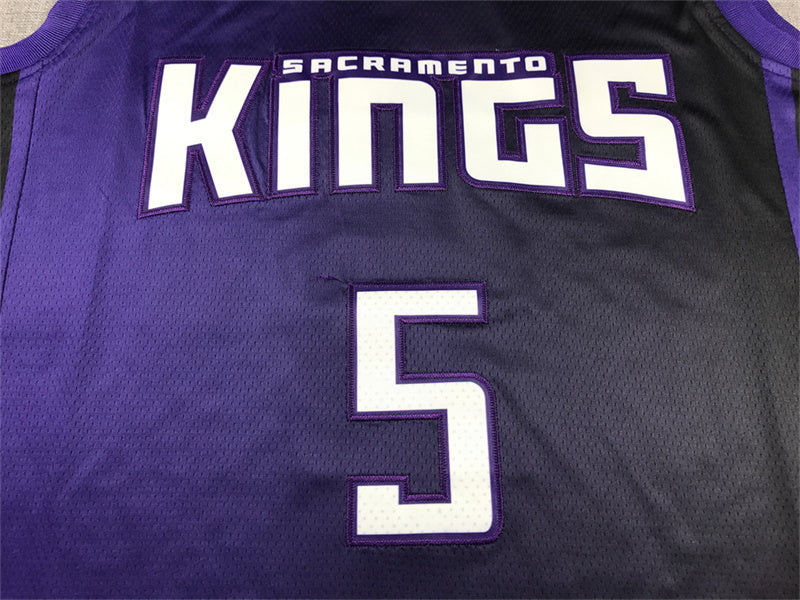 Fox name and white number 5 with purple edging on Sacramento Kings jersey back detail