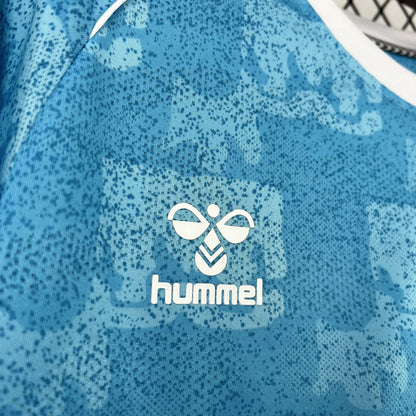 Close-up of the Coventry City crest on the 2025/26 home jersey